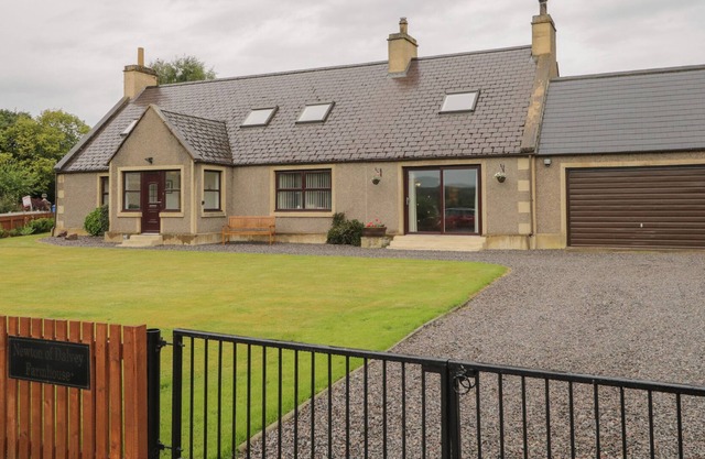 NEWTON OF DALVEY FARMHOUSE, pet friendly, with open fire in Forres