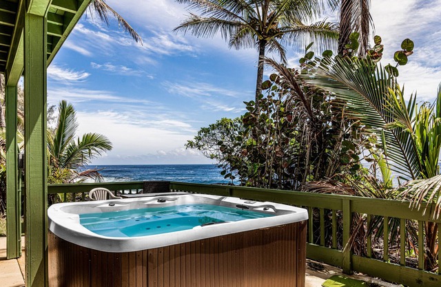 Oceanfront home with private hot tub, wraparound deck, ocean views, W/D & lanai