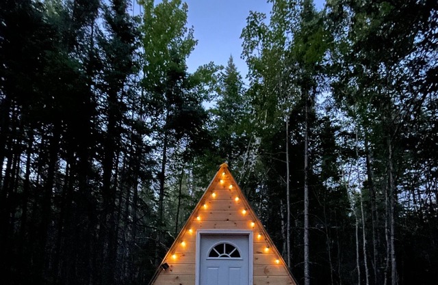 Off grid A-frame cabin nestled in the Maine woods