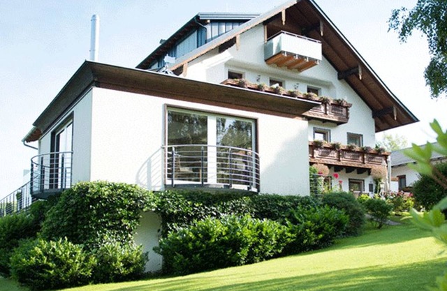 Panorama habitación con jard���������n de invierno - Pensión Irlingerhof ***
