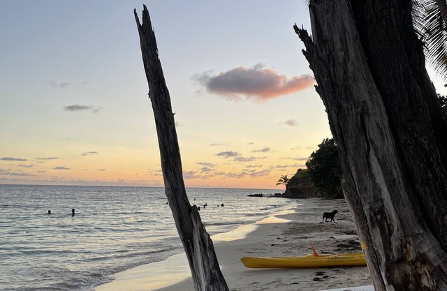 Paradise in sky and sea, feet in the water: