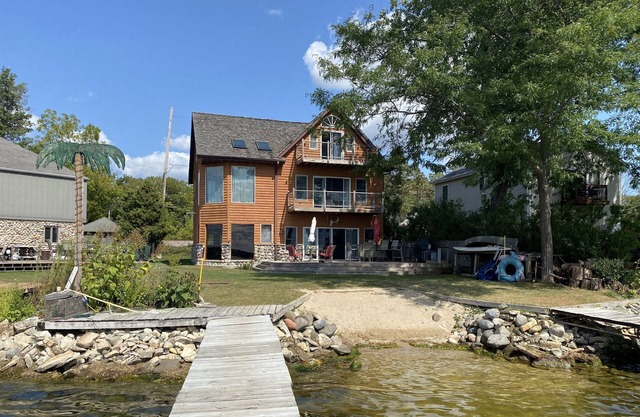 Pewaukee lake Sunset Lodge- sleeps 16 + (New, lower temps- lower prices)