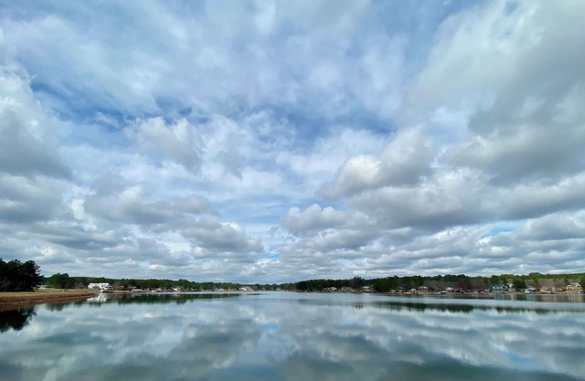 Put your feet up, relax and unwind on the screened porch or go jump in the lake!