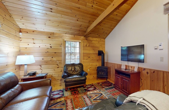 Relax in a two-bedroom cabin with fireplace, AC & access to outdoor adventures