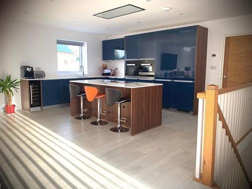 Relax in style at my stunning Holywell Beach home