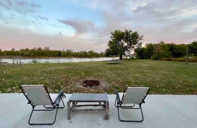 Riverfront Studio Cabin w/ Sunset View, Wi-Fi, Yard, and Fire-pit!