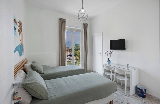 Habitación 'Napoli' con terraza compartida, Wi-Fi y aire acondicionado