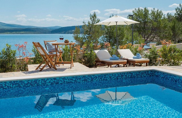 Seafront Villa Noah with heated pool
