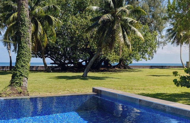 Seaside villa with swimming pool in a large garden
