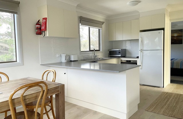 Destino Beach House: una casa desde el sur de Broulee Beach. Unidad superior