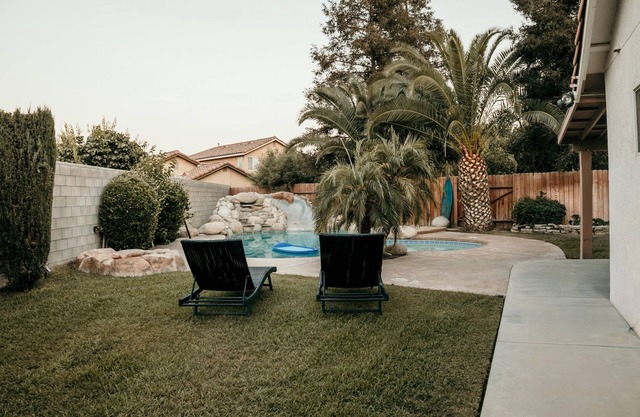 Spacious 4BDRM with a Stunning Pool+Game Room and Firepit