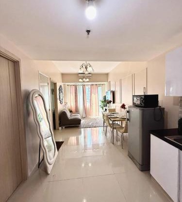 Spacious and Aesthetic 2 Bedroom with City-View Balcony at Grass Residences QC