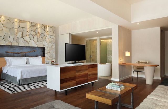 Amplia y moderna suite con artículos gratuitos de minibar (T Sand Suite40)