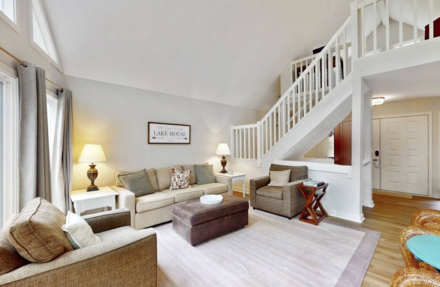 Spacious waterfront escape with screened porch, water slide, kayak, & games