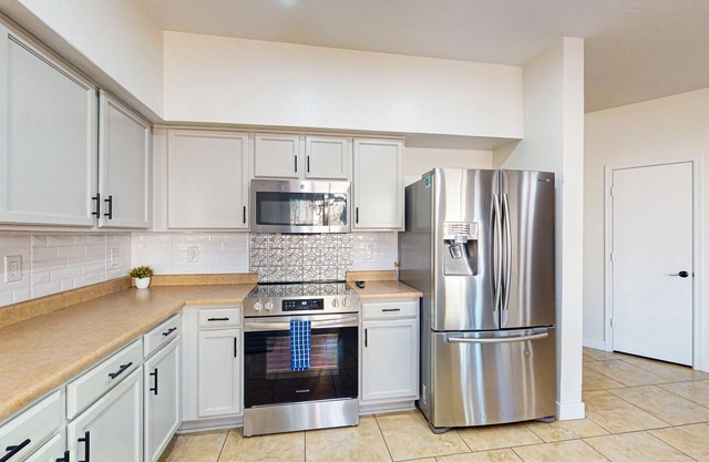 Spectacular home with private pool & pool chiller, grill, loft w/ games