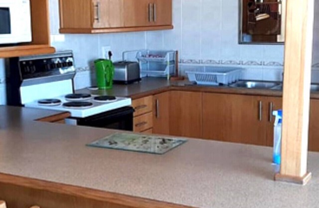 STEENBRAS 3 : 2bedr/ 1bathr first floor apartment, private lawn with BBQ