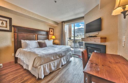 Steps to skiing, hotel room, mountain views, shared hot tub, sauna, steam room, fitness room 223A