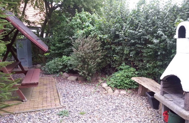 Apartamento vacacional con barcacoa en la terraza