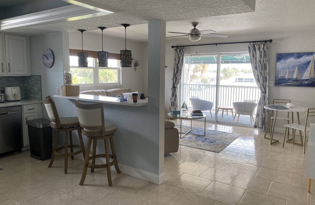 "Stunning Waterfront Apartment on Treasure Island with Dock"