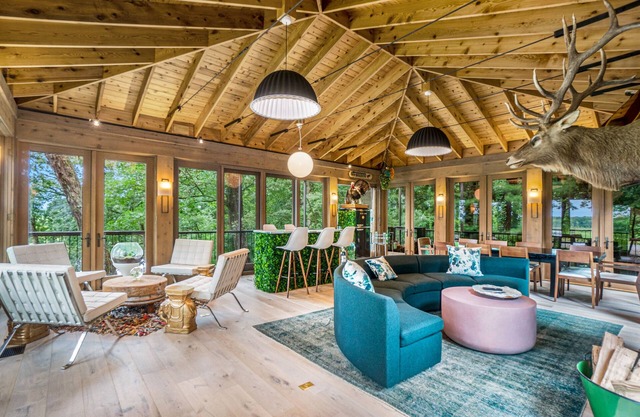 Stylish riverfront retreat w/ hot tub, screened boathouse, fishing dock & kayaks