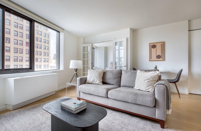 Superb Flatiron 1BR w/ Gym, Elevator & Doorman, nr Trains, by Blueground