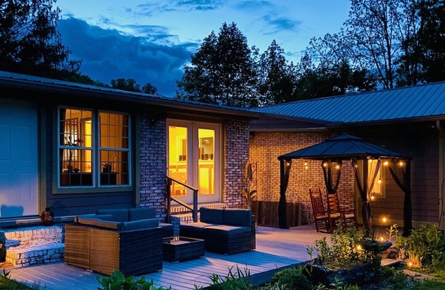 Surrounded by mountains on a gorgeous creek featuring your own private beach