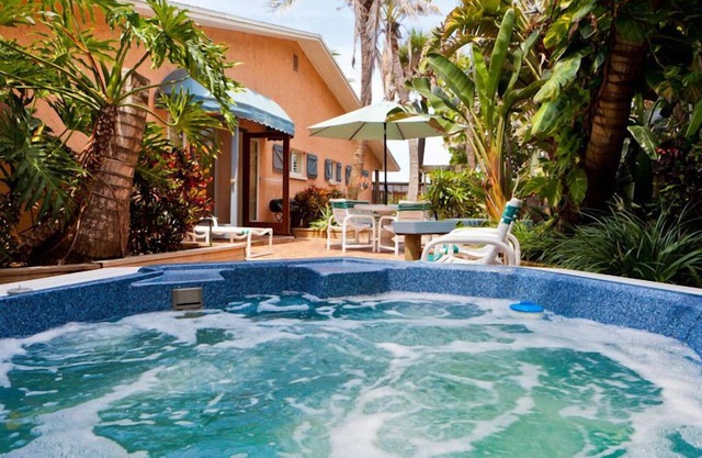 The Palms oceanfront villa. Sleeps up to 6, dog and family friendly.
