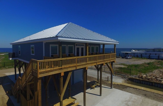 The Pointe, Grand Isle, LA Waterfront con acceso a botes, lanzamiento de botes, muelle de pesca iluminado