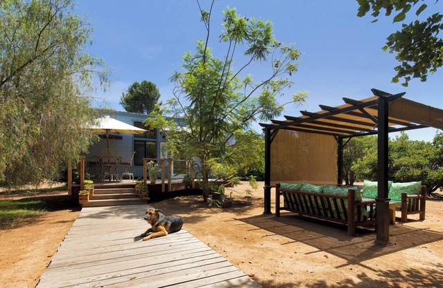 La pequeña casa de playa en Coral Tree House