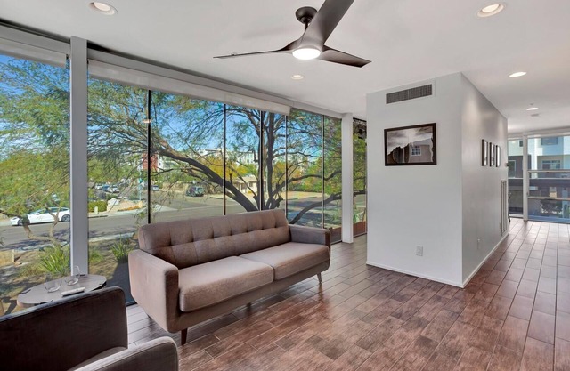 This fully updated, three-story contemporary townhome is the perfect spot for business or a getaway