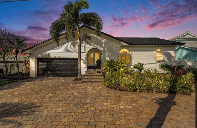 TREASURE ISLAND FLORIDA-- Discover your luxury 4 bedroom home on canal fishing