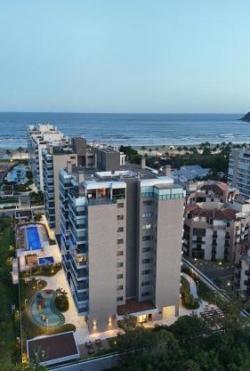 TULUM Bertioga - belo apartamento com vista para o mar
