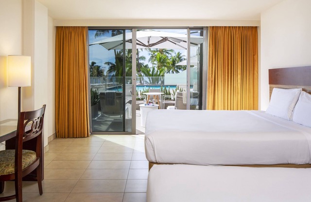 Two Rooms with Easy Pool Access! Property Close to Waikiki Beach!