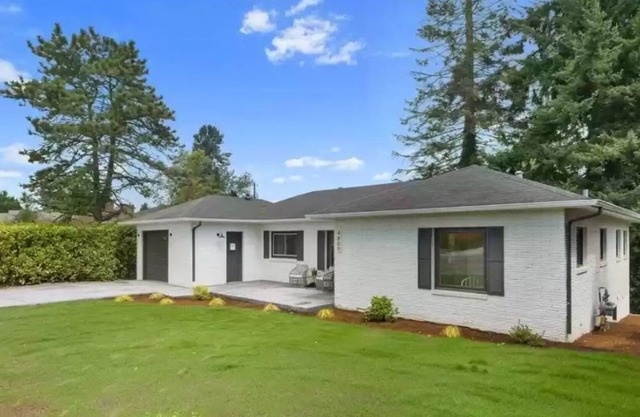 Two-story home with spacious yard, washer/dryer & central AC- dog-friendly
