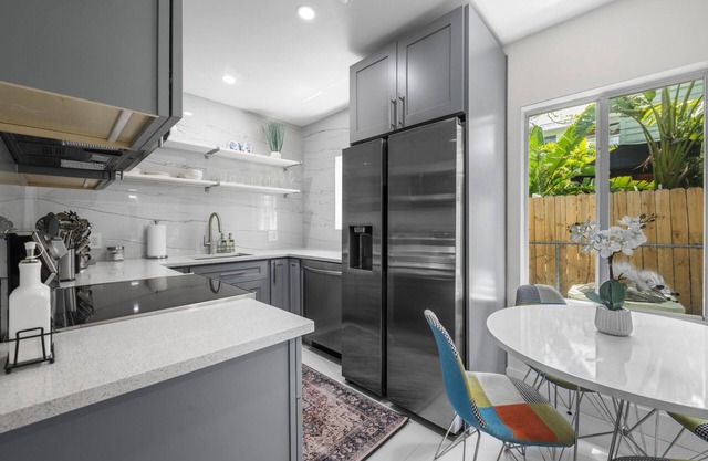 Uhost AI 1BR With Marble Accents Patio