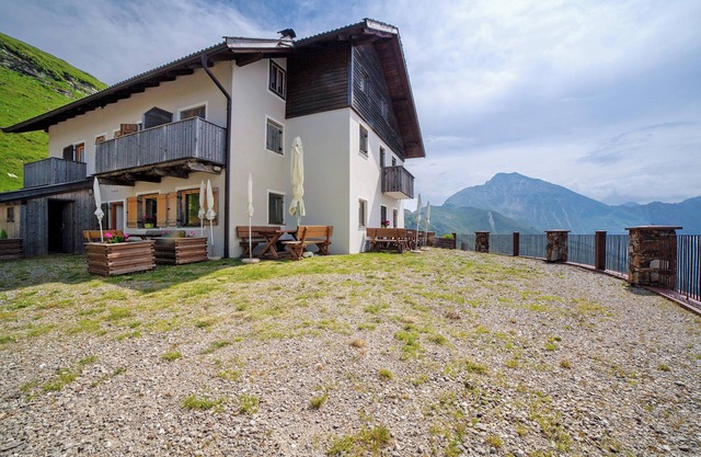 Casa de vacaciones "Enzianhuette" con vistas a la montaña, 3 balcones y terraza compartida