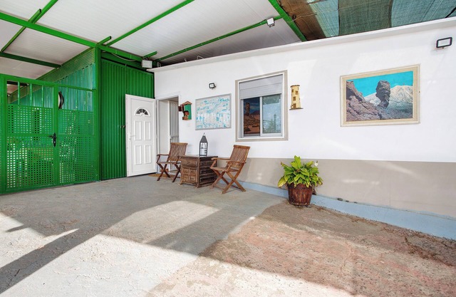 Casa de vacaciones 'Minipiso Rural Guía De Isora' con vistas a la montaña, terraza y Wi-Fi