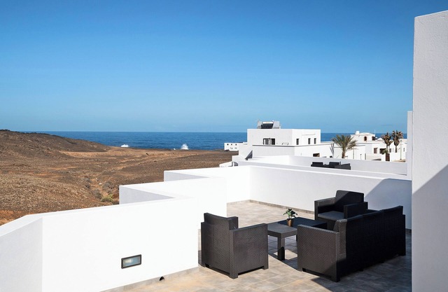 Casa de vacaciones 'Tritón 6' con vistas al mar, Wi-Fi y aire acondicionado
