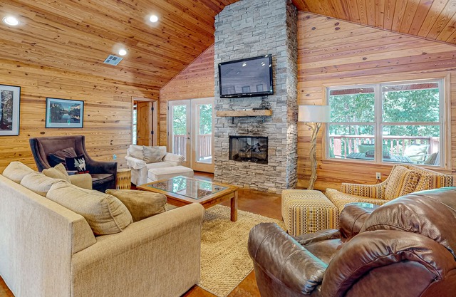 Water-view cabin with deck, gas grill, Ping-Pong & pool tables, fireplace
