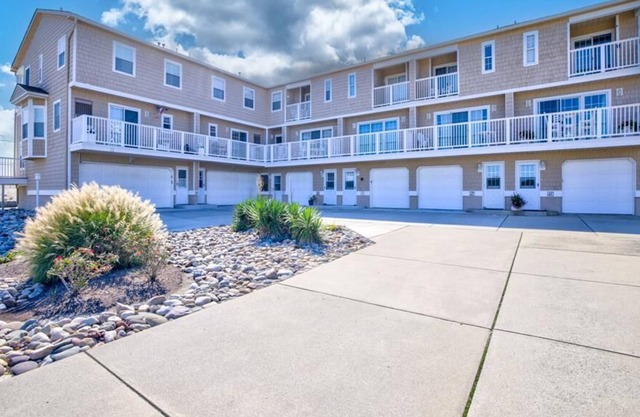 Waterfront 2 BR/3 BA townhome located just steps to the beach. Sleeps 6.