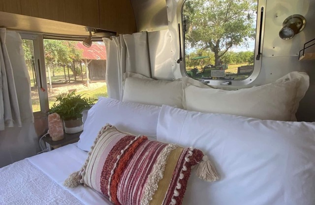 Waterfront Luxury Airstream on An Orange Grove