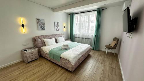 Almaty Apartamento | Городской поцелуй