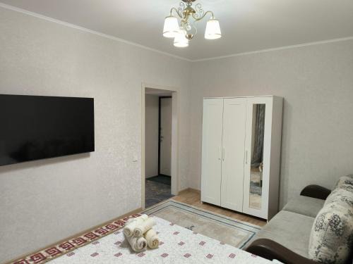 Almaty District Apartamento | Квартира рядом Новый вокзал Нурлы жол и мечеть Хазрет Султан, быстрый Wi-fi