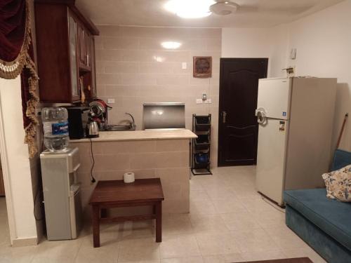 Shurtah al-Dakhlah Apartamento | قريه تافيرا بيتش راس سدر