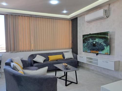 Al Jubeiha Apartamento | منزل السعادة