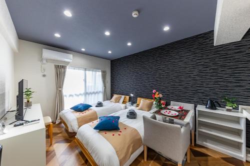Yonabaru Apartamento | オーシャンビュー窓から見える景色を想い出にThe琉球タワー10B