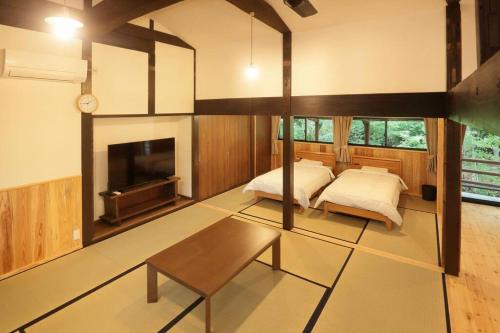 Minamiaso Casa | 【コテージくぎの】大谷川沿いの露天風呂があるコテージ