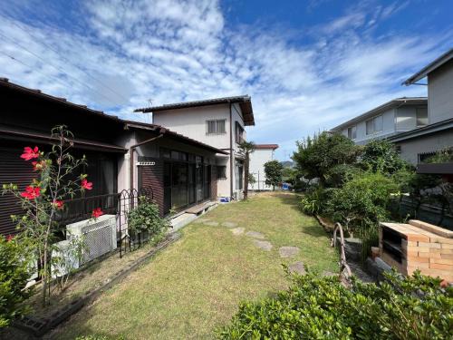 Ninomiya Casa | 湘南ソラル〜二宮の高台・アートな庭付き日本家屋121㎡/高速WiFi/芝生ドッグラン・ピザ窯BBQ有