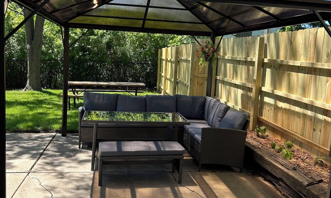 Saint Francis Casa | 1-5 bedroom house near airport: Projection TV, 2 car garage 1st floor bathroom