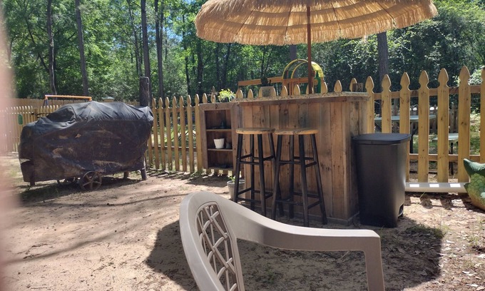 Plantersville Casa | 1BR 32' RV by Pond, Clean, Safe and Affordable with Playground and Pool.